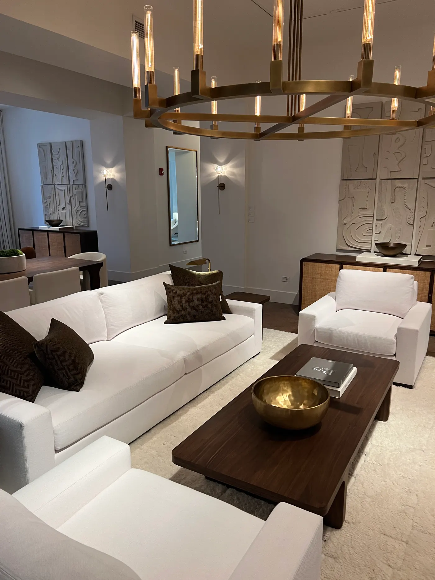 Bright luxury living room interior with floor-to-ceiling windows